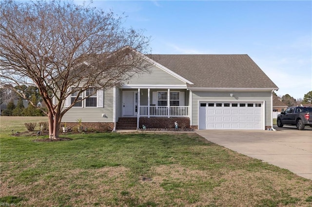 view of front of home featuring driveway, covered porch, a garage, and a front lawn