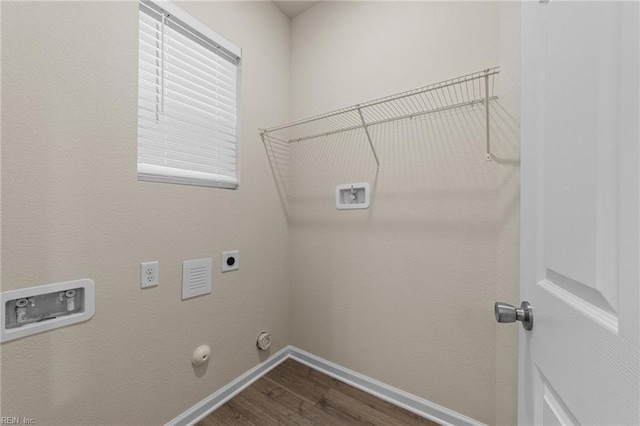 laundry area featuring gas dryer hookup, laundry area, hookup for a washing machine, and hookup for an electric dryer