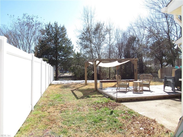 view of yard with a patio area and a fenced backyard