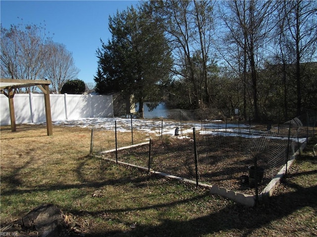 view of yard with fence