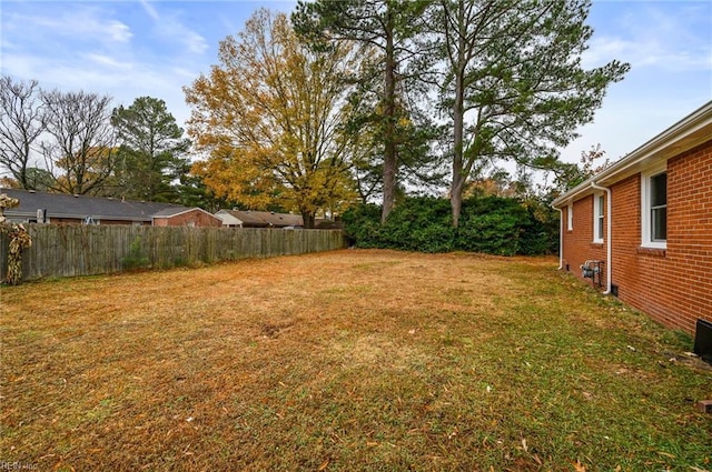 view of yard with fence