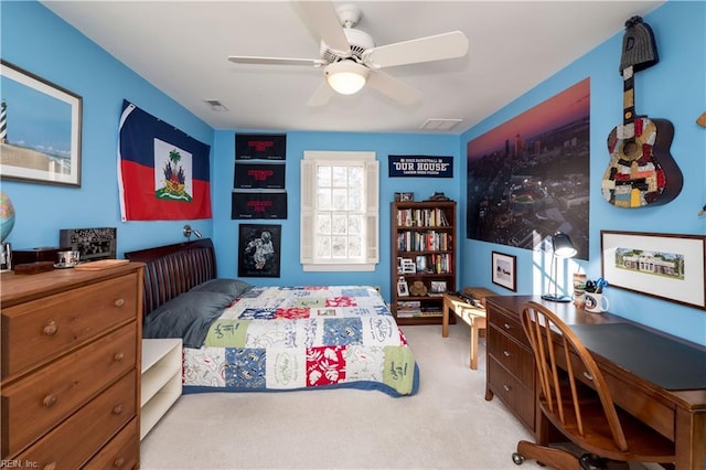 bedroom with visible vents and light colored carpet