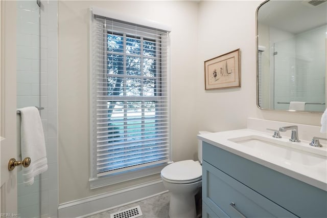 full bathroom featuring visible vents, vanity, toilet, and an enclosed shower