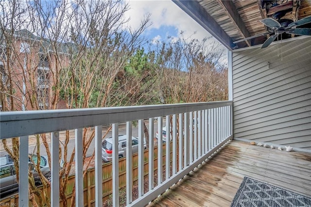 wooden terrace featuring ceiling fan