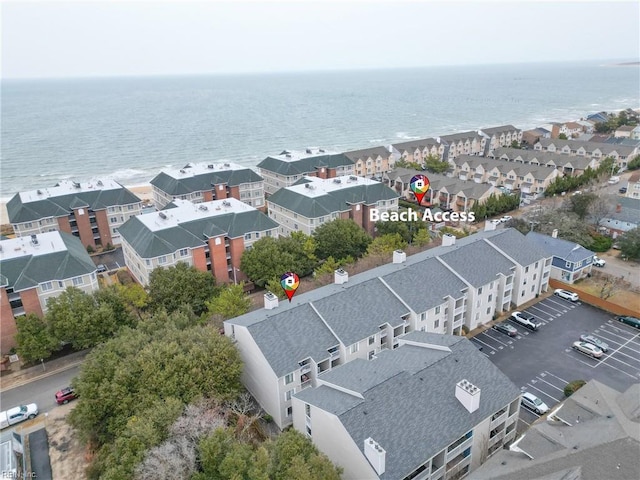 aerial view featuring a water view and a residential view