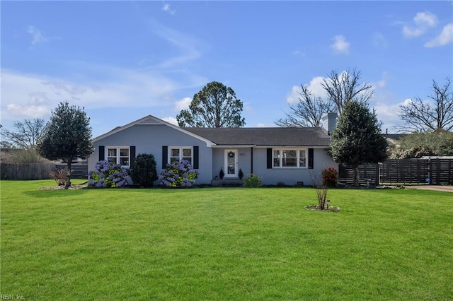 single story home featuring fence, a front lawn, and stucco siding