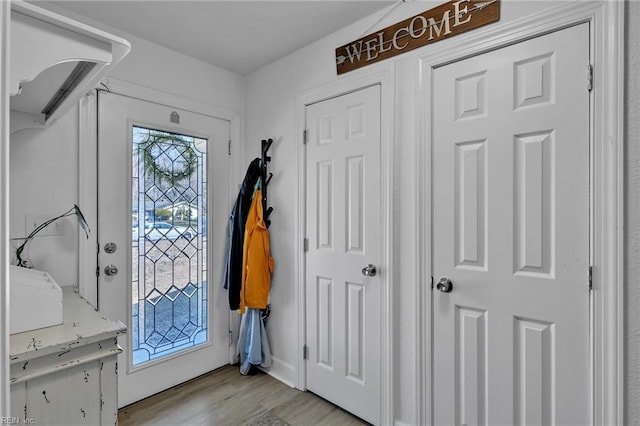 entryway featuring light wood-style floors