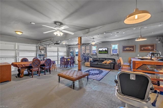 interior space featuring a ceiling fan