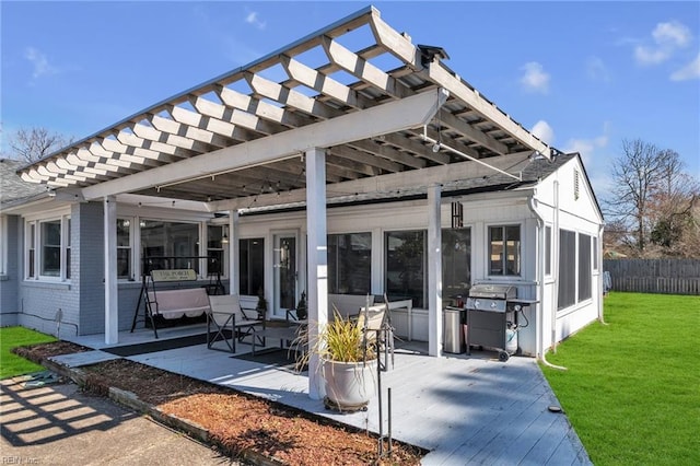 view of patio with fence, a deck, a pergola, and area for grilling