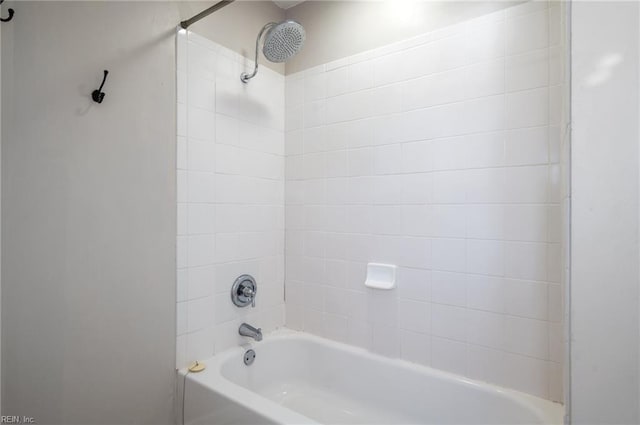 bathroom with shower / bathtub combination