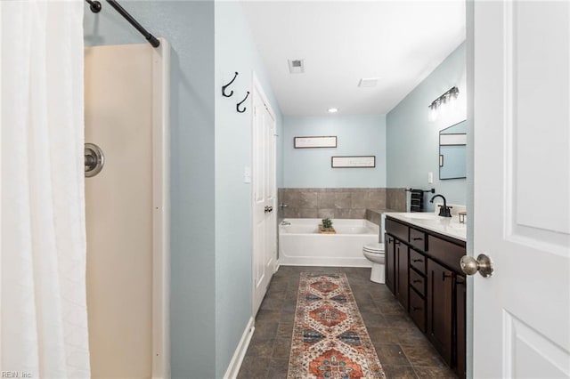 bathroom with a shower, a garden tub, visible vents, stone finish floor, and vanity