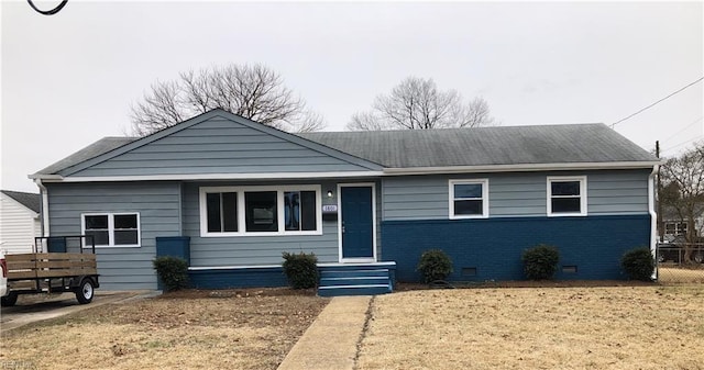 ranch-style house with brick siding and crawl space