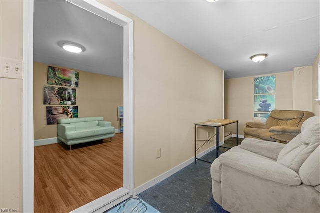 living room featuring baseboards