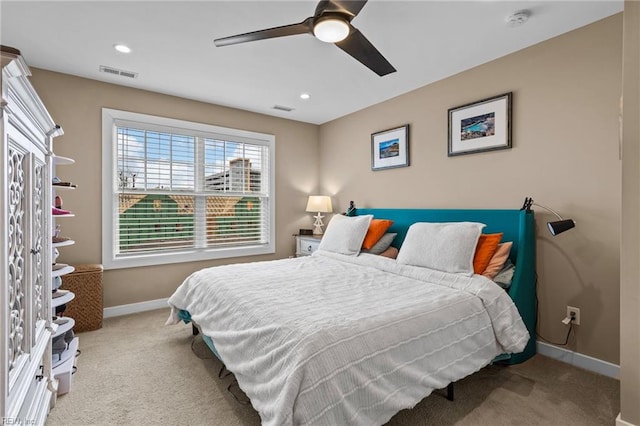 carpeted bedroom featuring baseboards, visible vents, ceiling fan, and recessed lighting