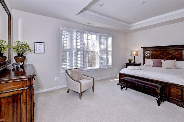 bedroom with a raised ceiling, light carpet, visible vents, and baseboards