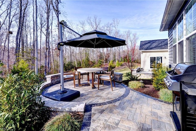 view of patio / terrace featuring outdoor dining space and area for grilling