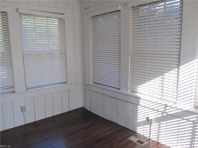 room details with wood finished floors and visible vents