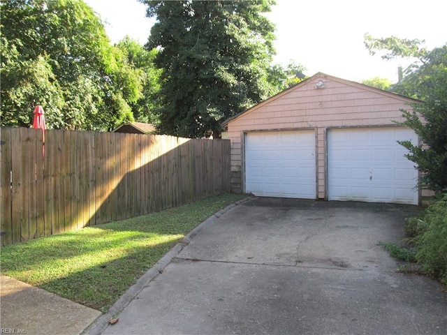 detached garage with fence