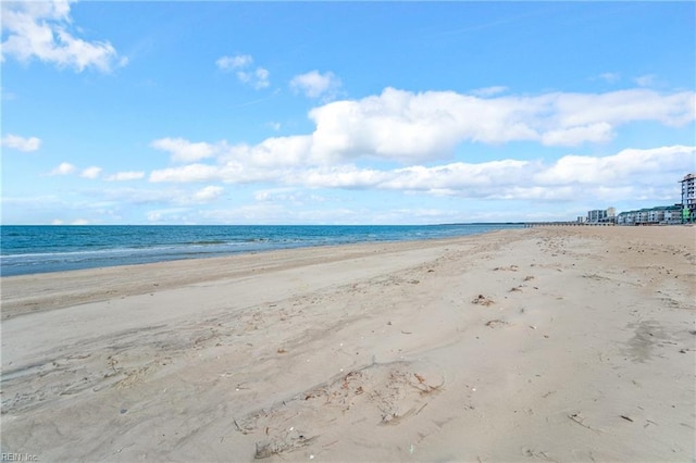 view of water feature with a beach view