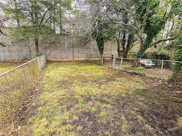 view of yard with a fenced backyard