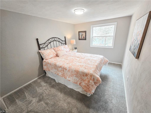 bedroom with carpet and baseboards