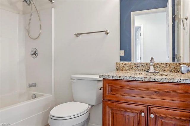 full bathroom featuring shower / tub combination, vanity, and toilet