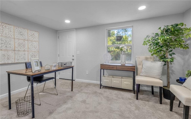 office featuring recessed lighting, light carpet, a textured wall, and baseboards