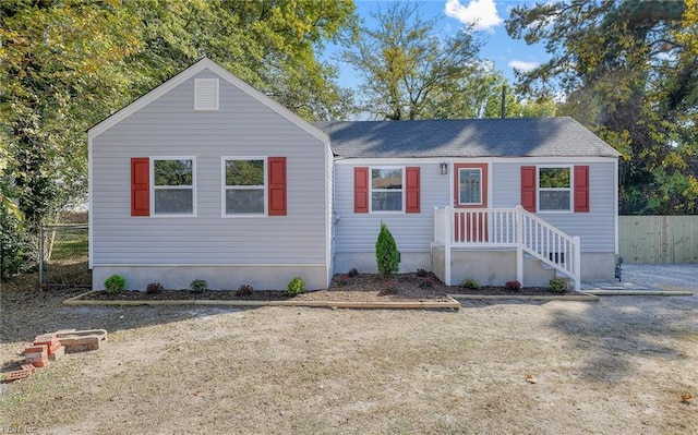 view of front of home with fence