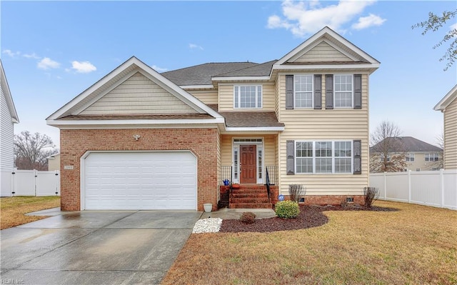 traditional-style house with concrete driveway, crawl space, a front yard, and fence