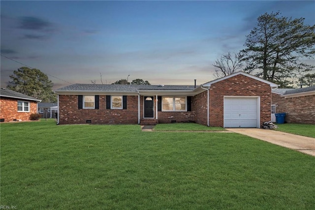 single story home with a garage, brick siding, concrete driveway, crawl space, and a front lawn