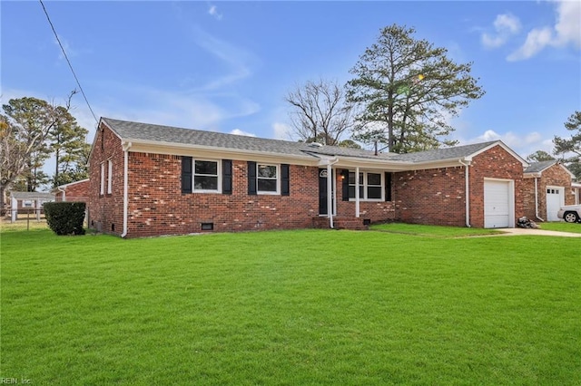 ranch-style home featuring brick siding, an attached garage, crawl space, driveway, and a front lawn