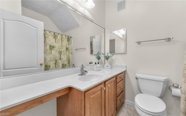 bathroom featuring toilet, vanity, visible vents, and lofted ceiling