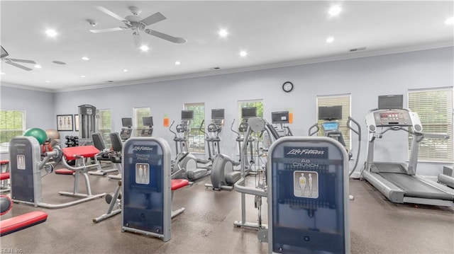 workout area featuring ornamental molding, recessed lighting, a wealth of natural light, and ceiling fan