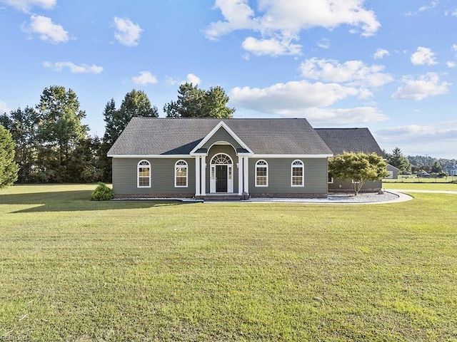 view of front of property with a front yard