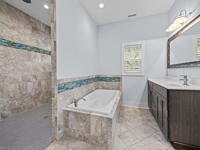 full bathroom with a garden tub, recessed lighting, visible vents, vanity, and walk in shower