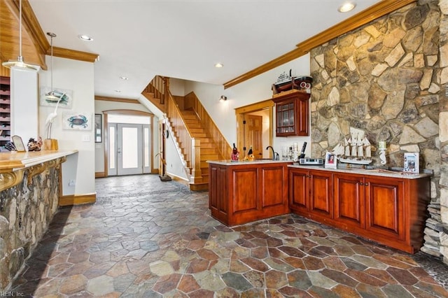 9954 Bonniville Rd, Hayes, VA 23072 - bar with stone flooring, stairs, crown molding, indoor wet bar, and recessed lighting
