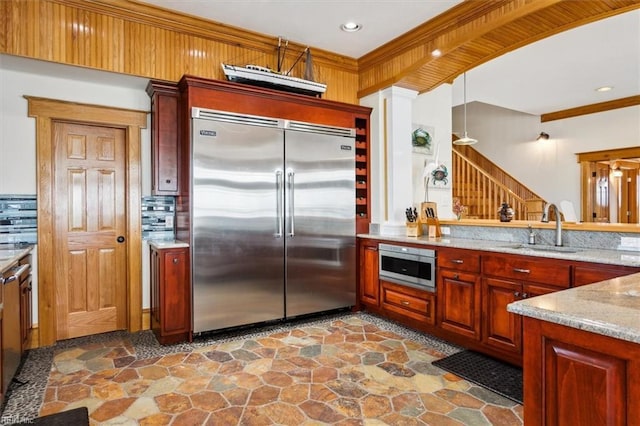 9954 Bonniville Rd, Hayes, VA 23072 - kitchen with light stone counters, hanging light fixtures, backsplash, stainless steel built in fridge, and a sink