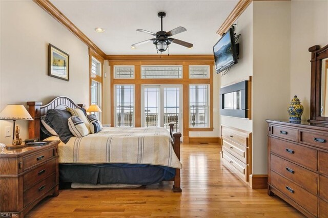 9954 Bonniville Rd, Hayes, VA 23072 - bedroom featuring ornamental molding, access to outside, light wood-style flooring, and baseboards