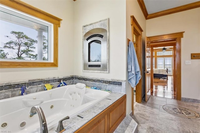 9954 Bonniville Rd, Hayes, VA 23072 - full bathroom with crown molding, connected bathroom, and a tub with jets