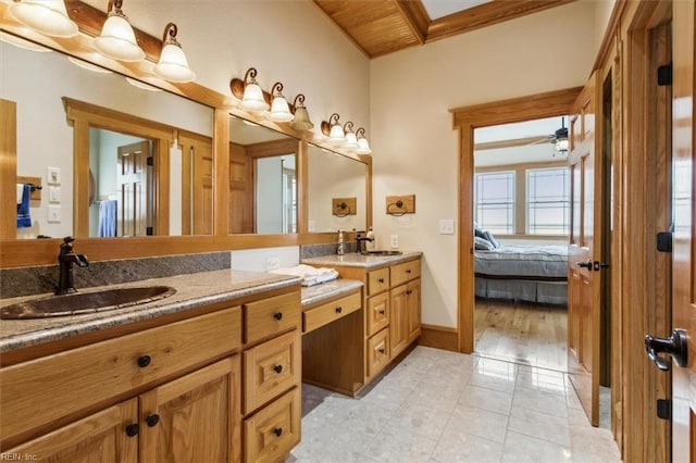 9954 Bonniville Rd, Hayes, VA 23072 - ensuite bathroom with double vanity, ensuite bath, a sink, and tile patterned floors