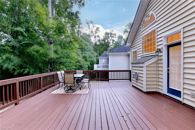 deck featuring outdoor dining space