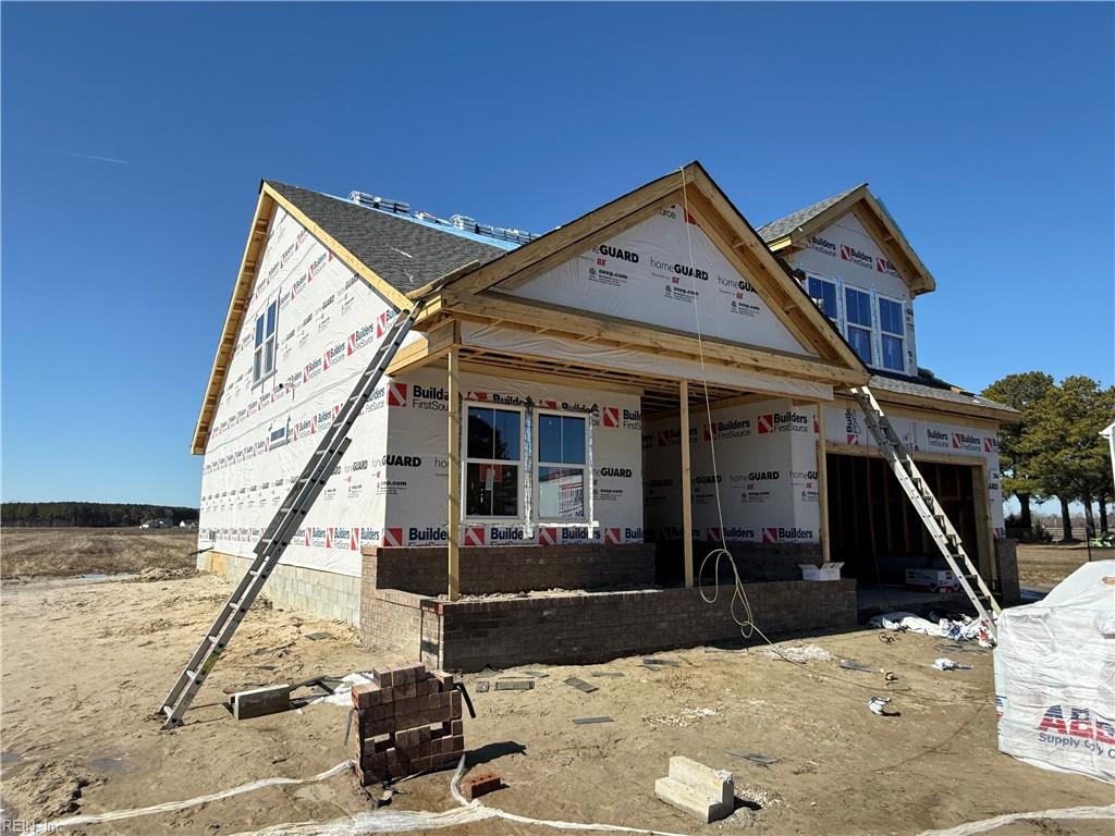 property under construction featuring an attached garage