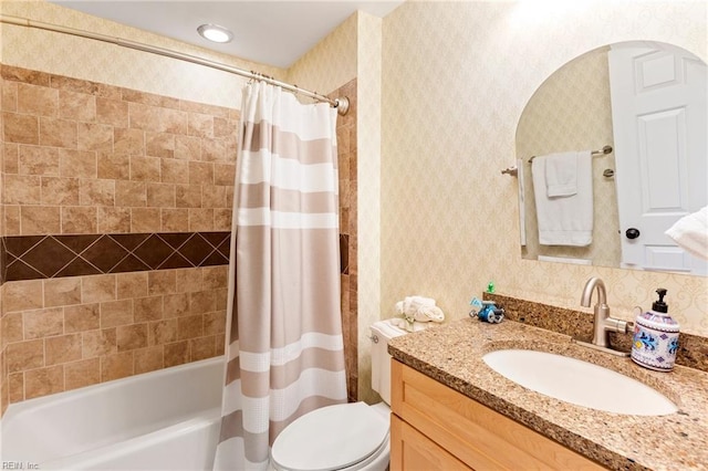 full bathroom with toilet, shower / tub combo, vanity, and wallpapered walls