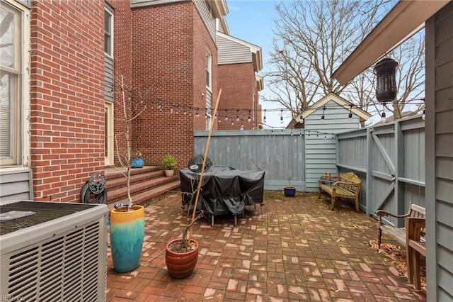 view of patio / terrace featuring a fenced backyard and cooling unit