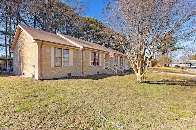 view of property exterior featuring crawl space, a yard, and brick siding