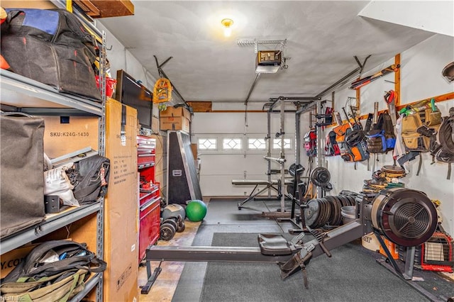 workout area with a garage