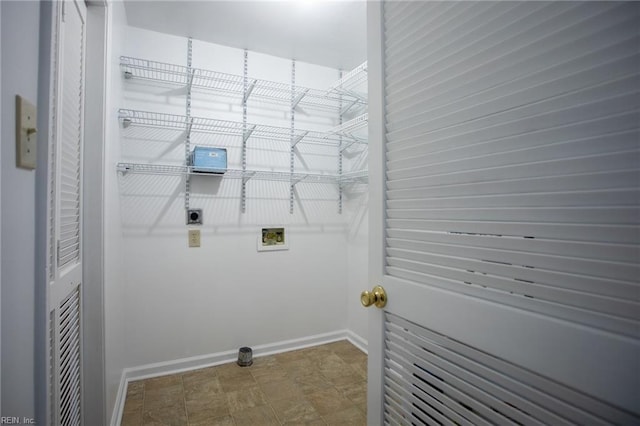 laundry area featuring washer hookup, laundry area, hookup for an electric dryer, and baseboards