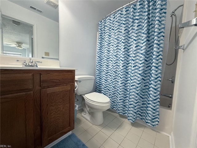 bathroom with toilet, tile patterned flooring, vanity, and visible vents