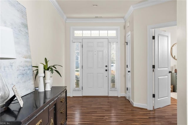 entrance foyer with baseboards, ornamental molding, and dark wood finished floors