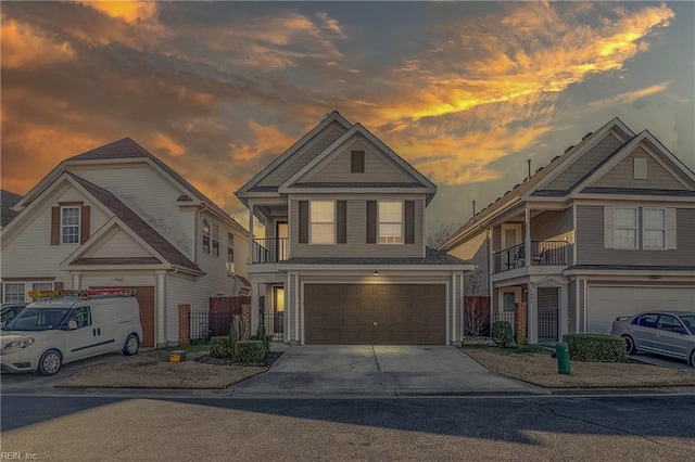 view of front of house featuring a garage and concrete driveway